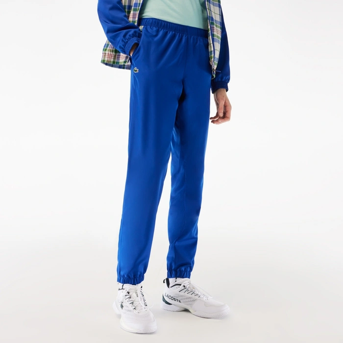 Kompletny męski dres Lacoste Sport spodnie + kurtka niebieski r. XS